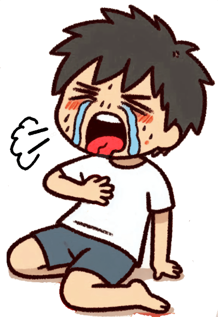 トローチを喉に詰まらせて苦しそうな表情をしている男の子