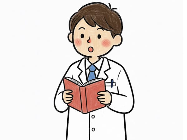 薬剤師が医療本を読んで驚いている様子。